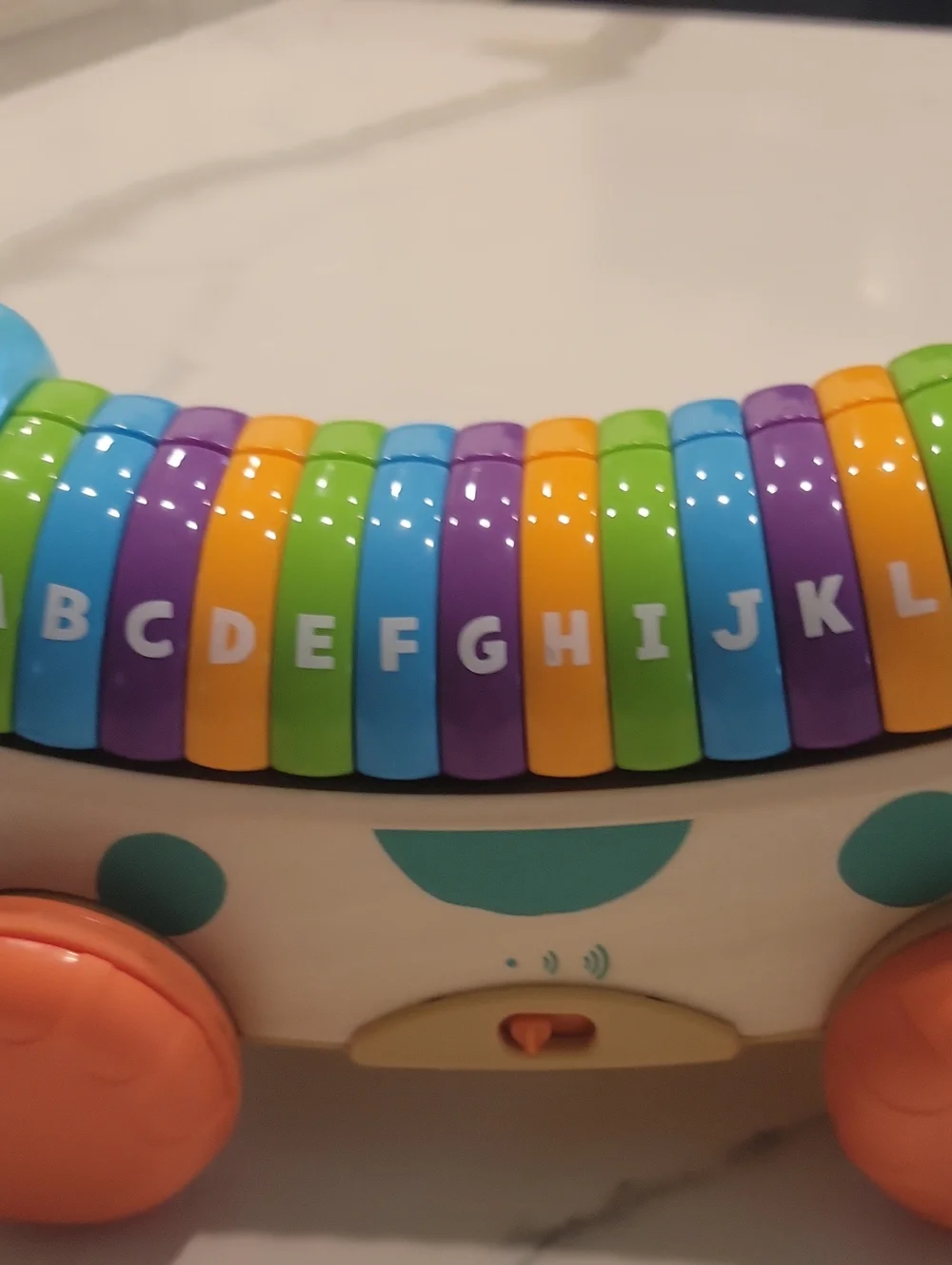 Leapfrpg Pull-Along Dog Xylophone Toy in Blue, Orange, Green